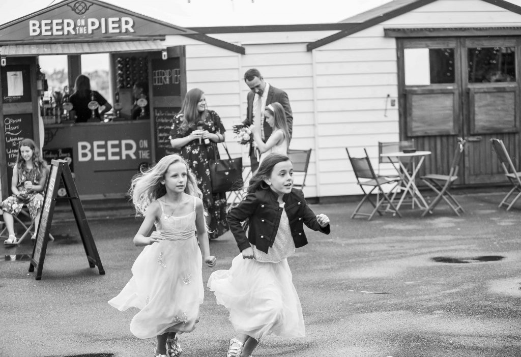 children running at Herne bay wedding venue