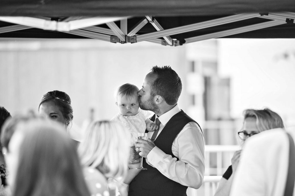 groo with baby at Herne bay wedding