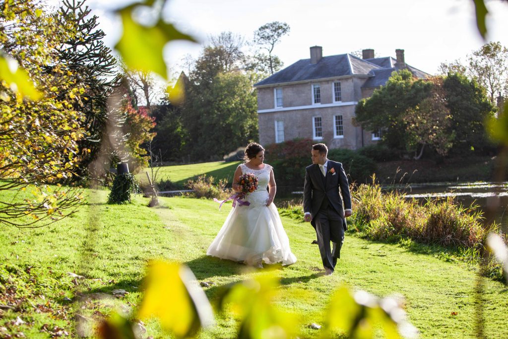bride and groom in grounds of Preston Court