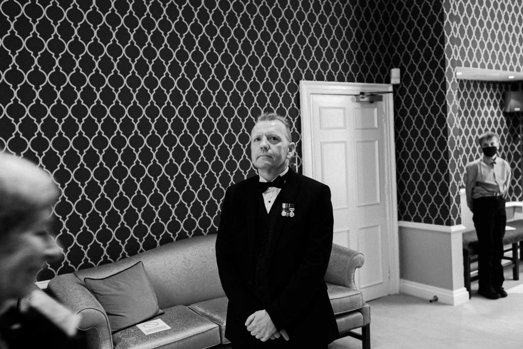 groom waiting for bride entrance to wedding ceremony