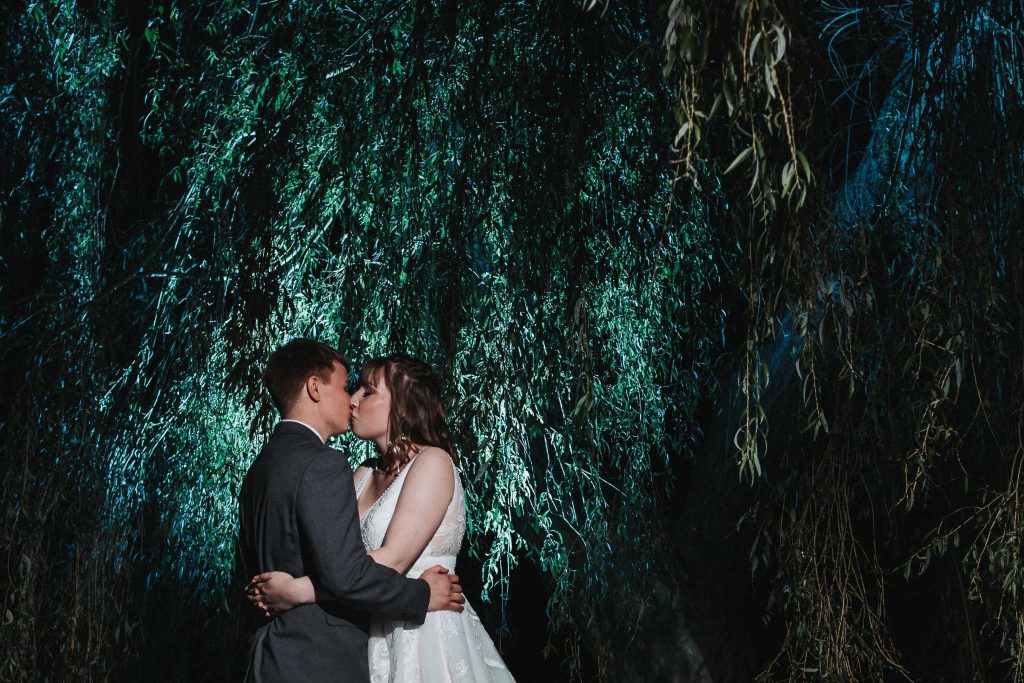 sandwich wedding couple portrait at night