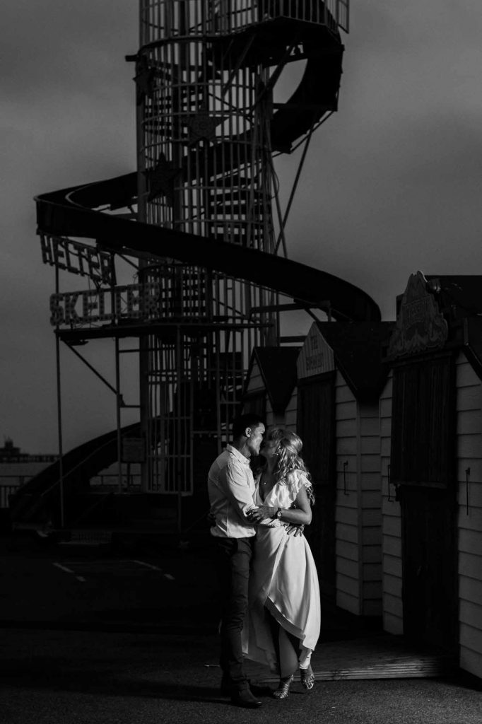 bride and groom portrait at beach hut weddings on Herne Bay pier