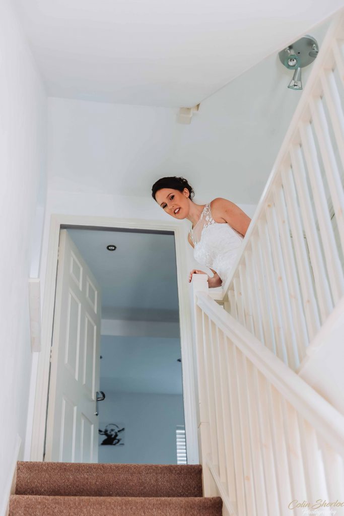 bride at top of stairs