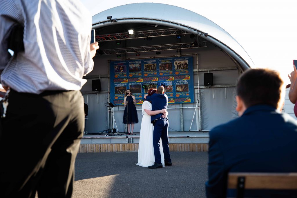 bride and groom first dance on herne bay pier