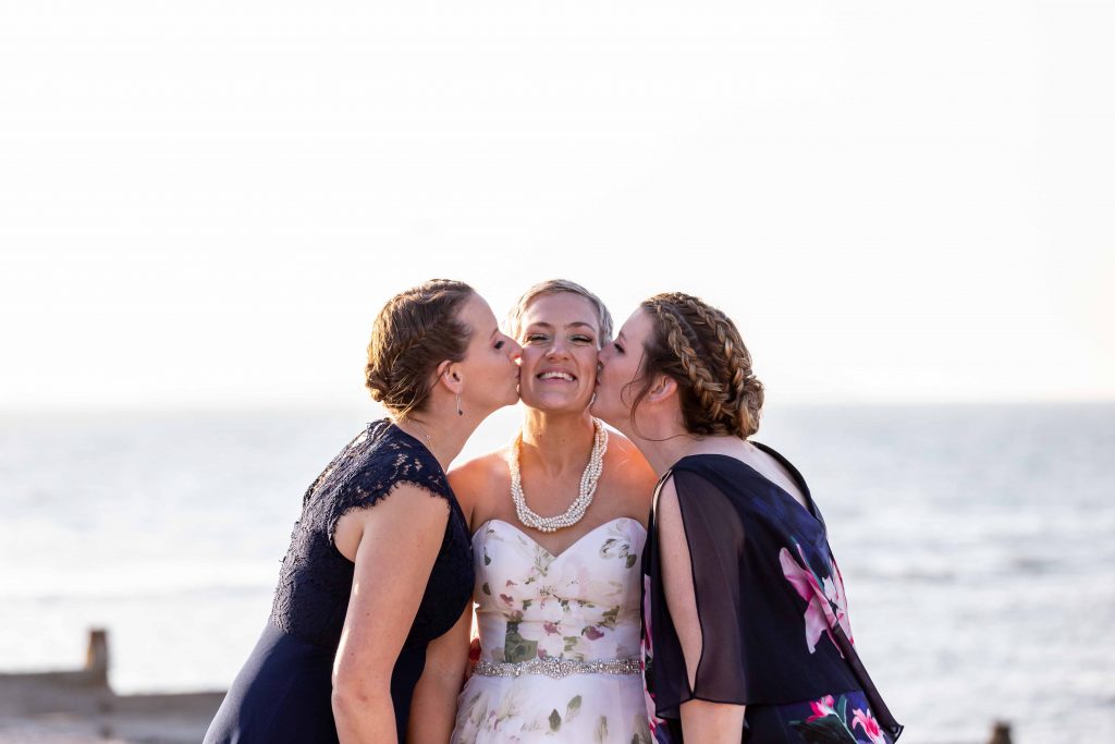 bride posing with best friends