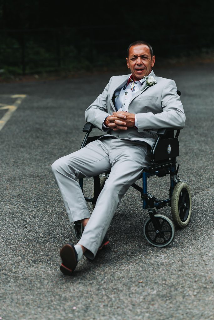 father of groom in wheelchair at canterbury micro wedding