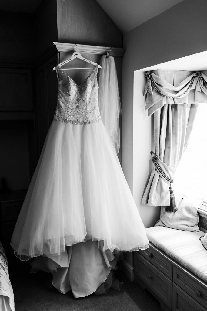 wedding dress in window light