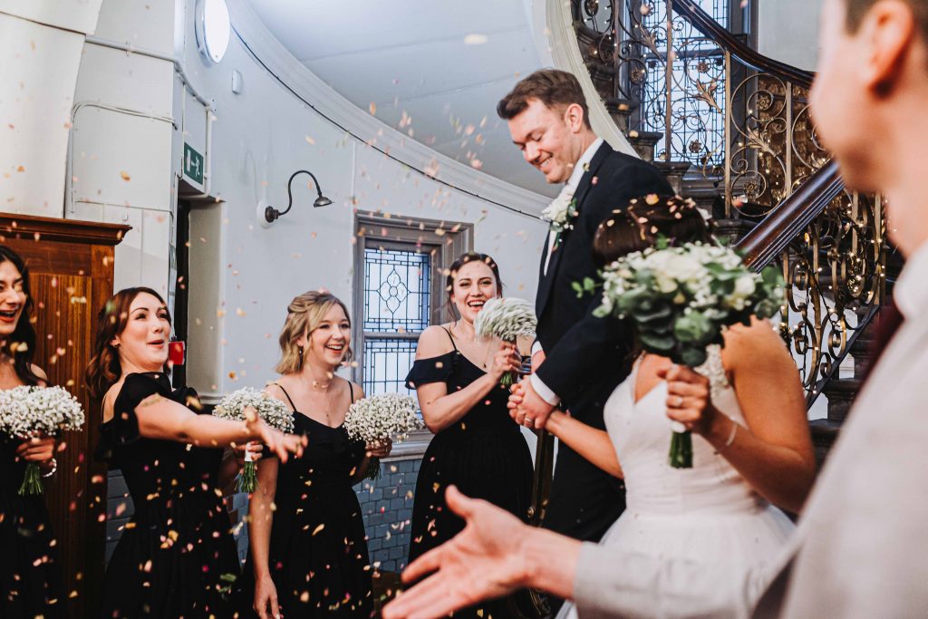 confetti being thrown at Old Finsbury Town Hall wedding