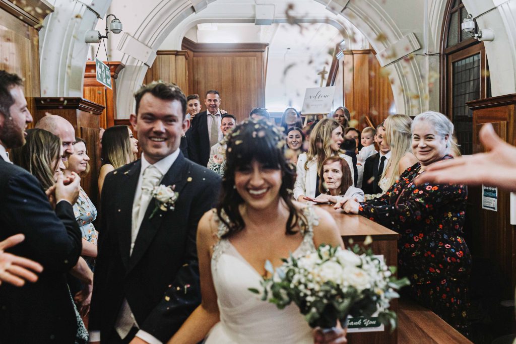 confetti being thrown at Old Finsbury Town Hall wedding