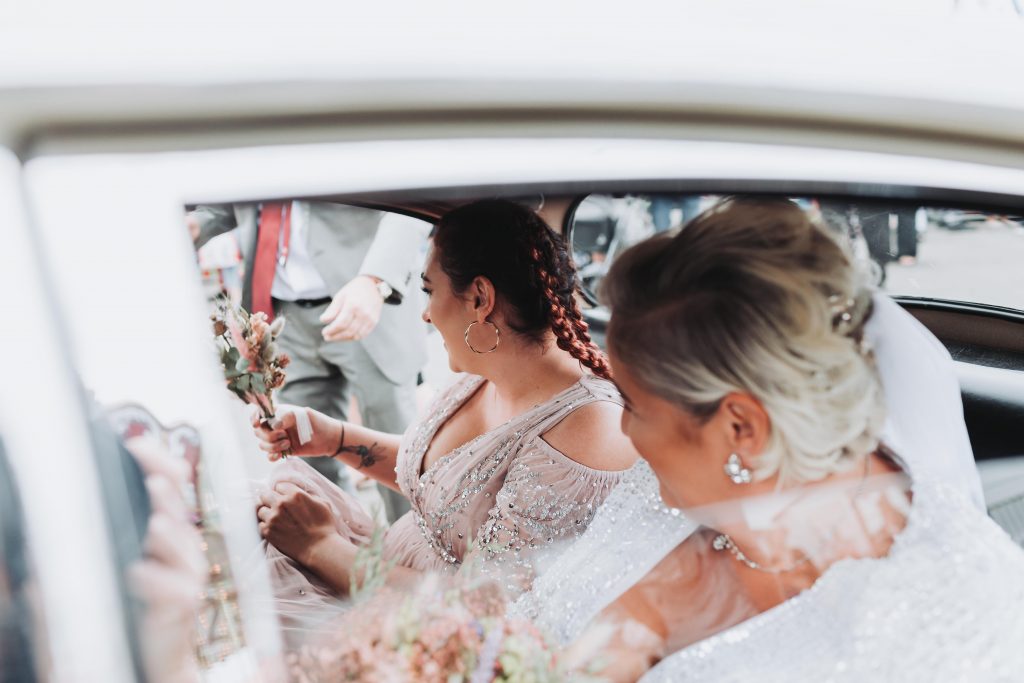 bride in wedding car on herne bay pier