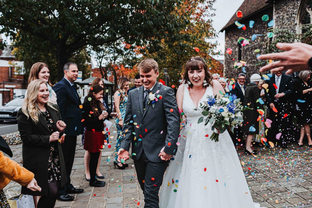 confetti thrown at bride and groom