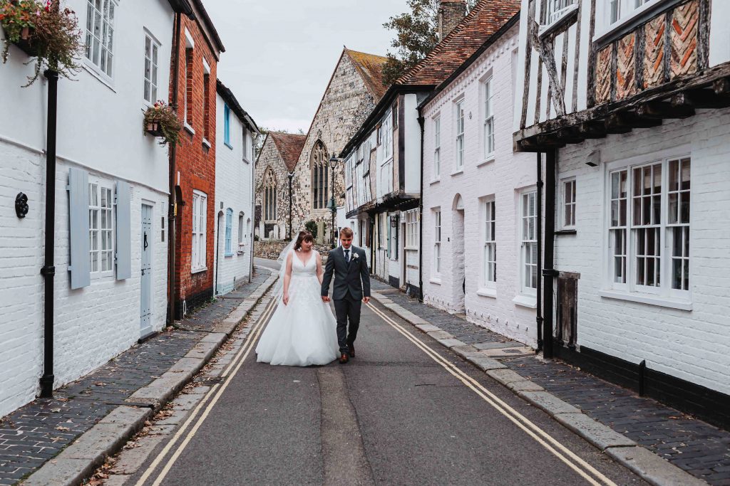 sandwich wedding couple portrait