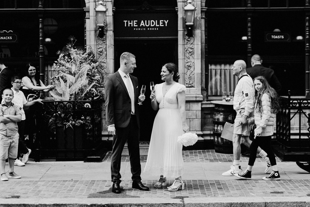 bride and groom portraits on streets of Mayfair, London