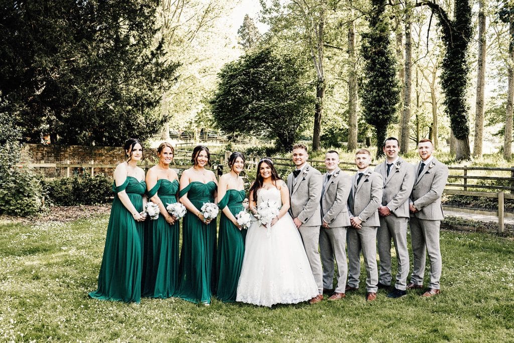 group portrait of bride and groom with bridesmaids and groomsmen