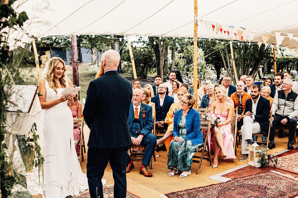 wedding vows being said by Guston Court Wedding Photographer