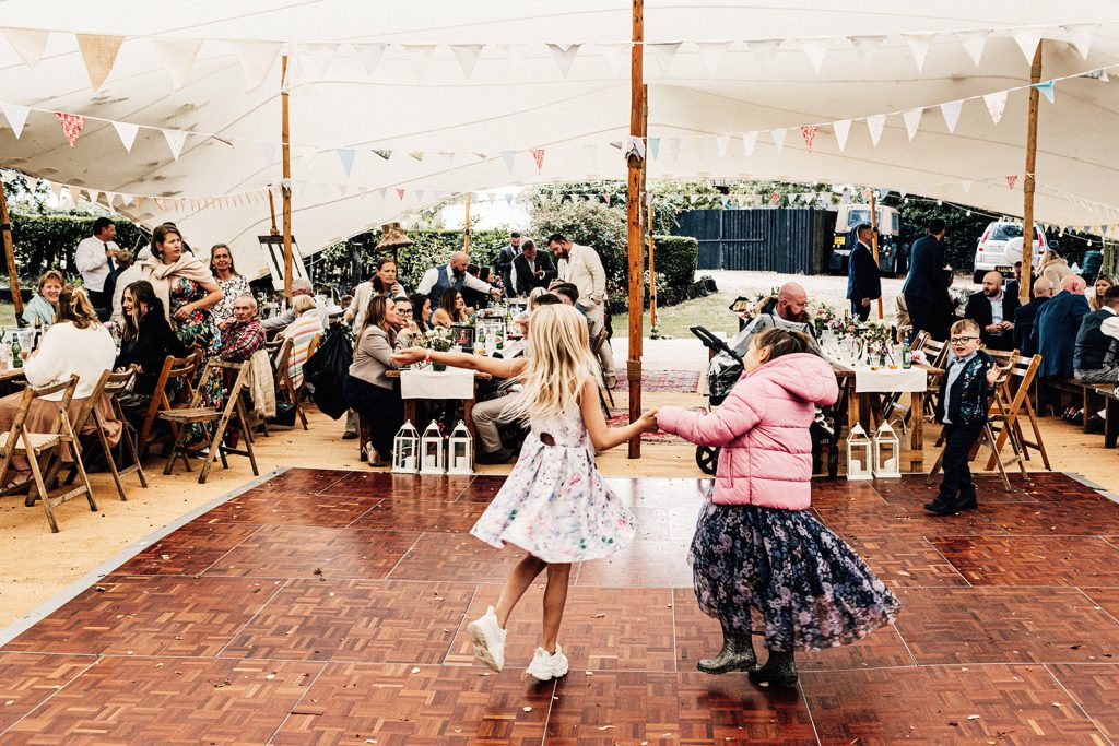 children dancing on dance floor in a tipi at a wedding at Guston Court