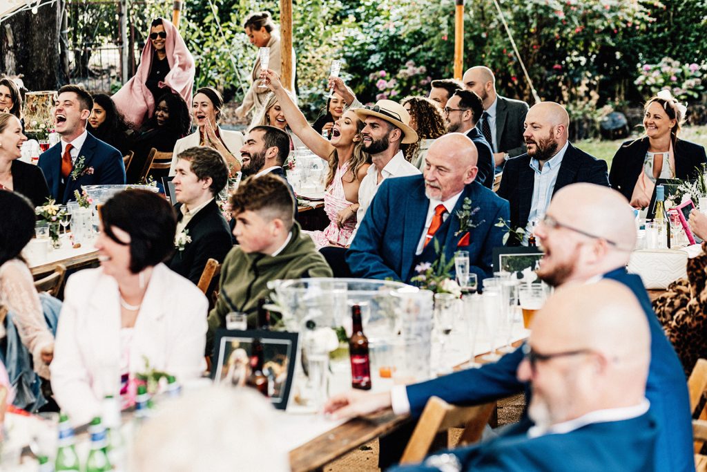 guests reactions at wedding speeches by Guston Court Wedding Photographer