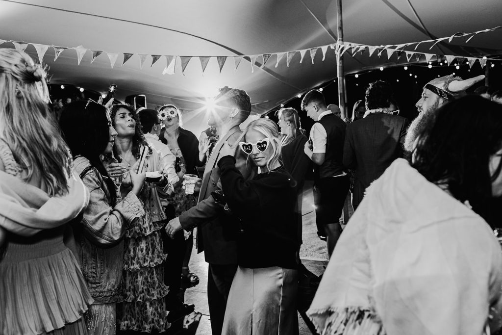 wedding guests partying on the dance floor captured by Kent wedding photographer