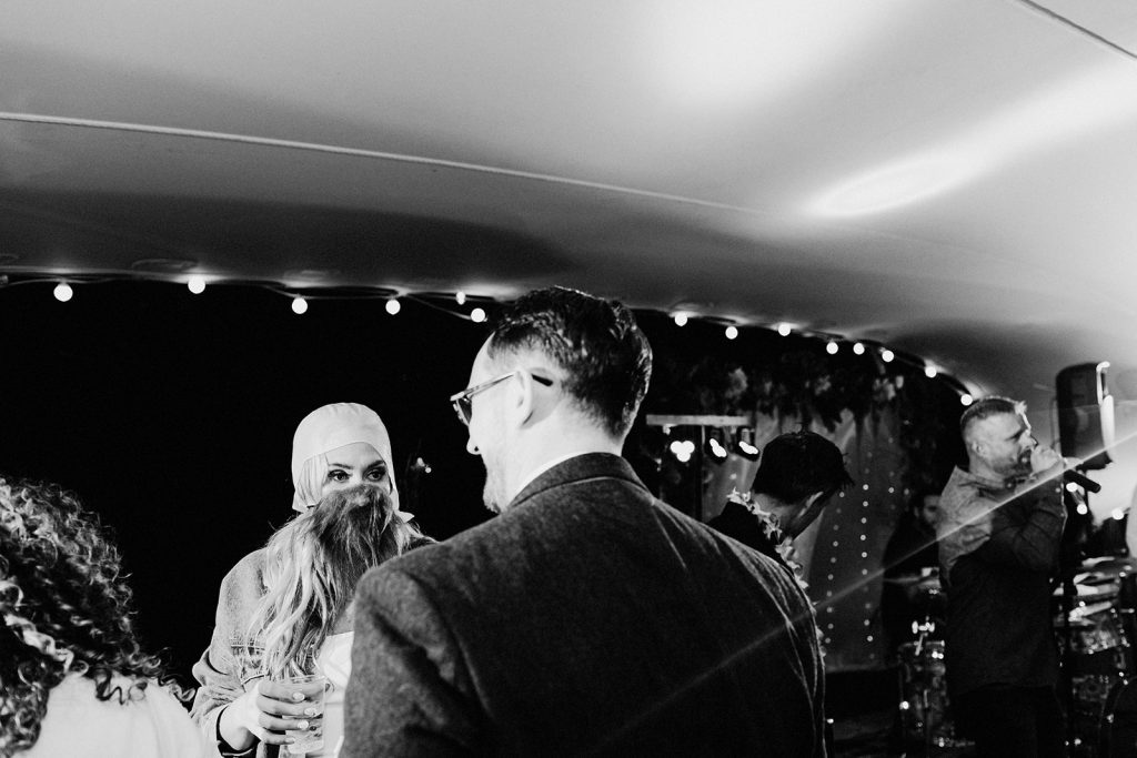 bride on dance floor wearing false bald cap and beard at Guston Court wedding