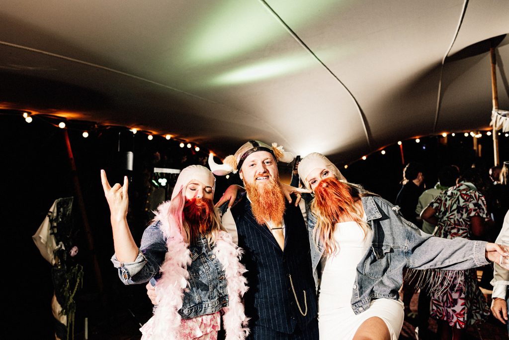 bride, groom and maid of honor in fancy dress on dance floor at Guston court wedding