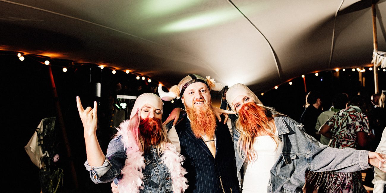 bride, groom and maid of honor in fancy dress on dance floor at Guston court wedding