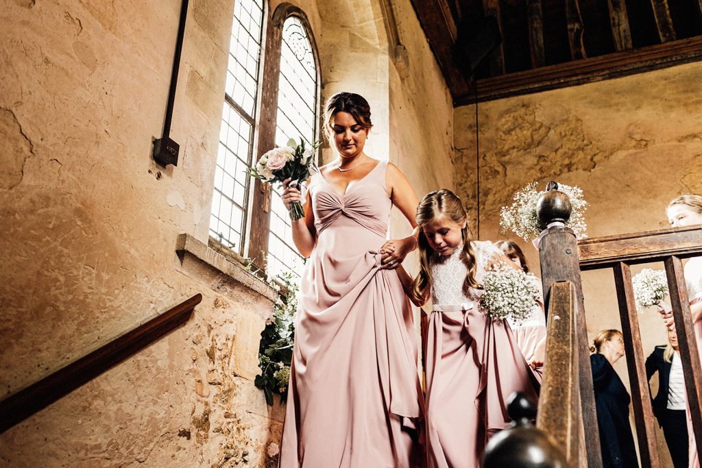 bridesmaids leaving ceremony