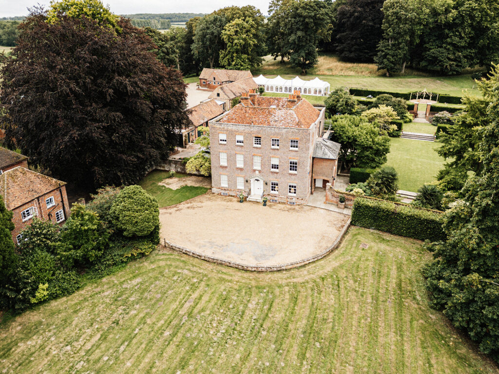 aerial view of the Manor House and grounds of Swarling manor wedding venue.